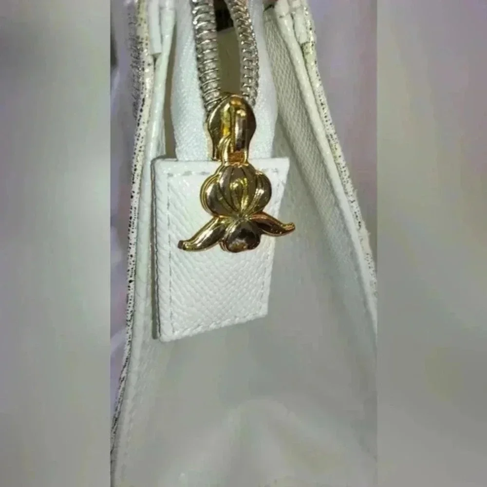 Gold Metallic Floral Embossed Cosmetic Bag‎ Zebra Print Lining Iris Zipper Pull